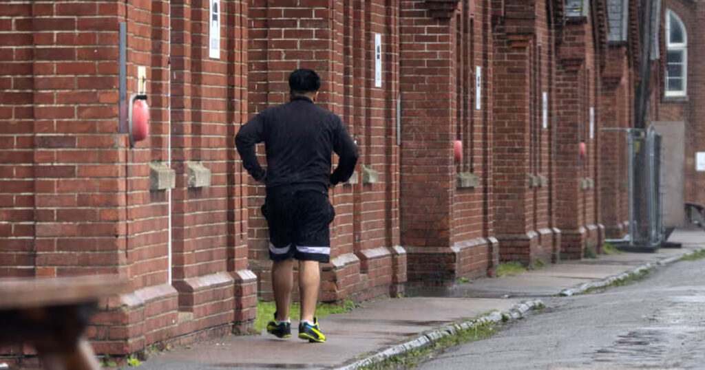 UK Extends Napier Barracks Amid Surge in Boat Arrivals